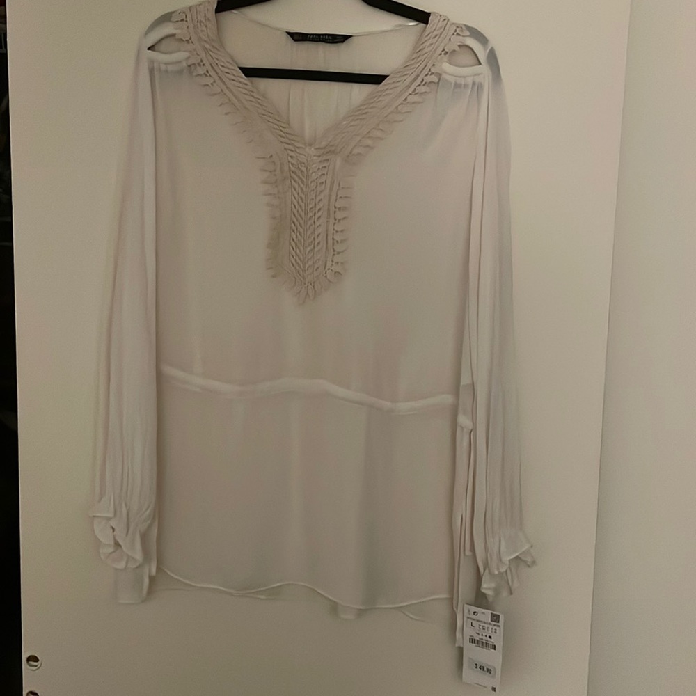 Ecru sheer with lace bib detail blouse